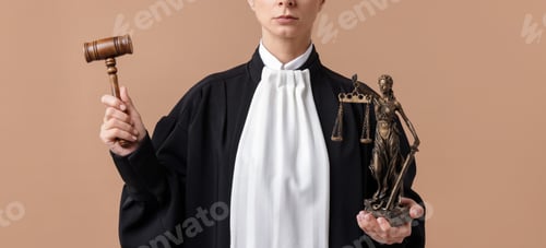 Preview: Judge with mallet and figure of Lady Justice on light brown background, closeup