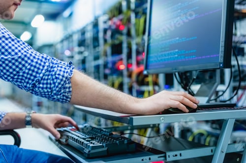 Preview: IT specialist working in bitcoin and crypto currency mining farm