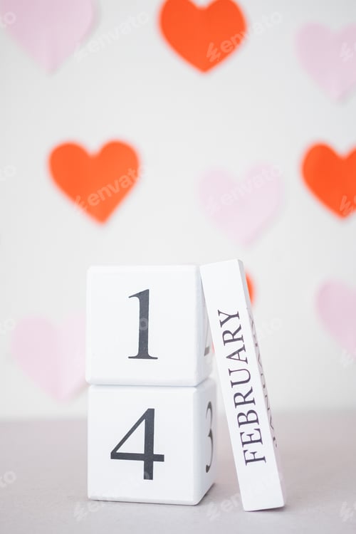 Preview: 14 February date calendar. Saint Valentine's celebration concept. Holiday and symbols