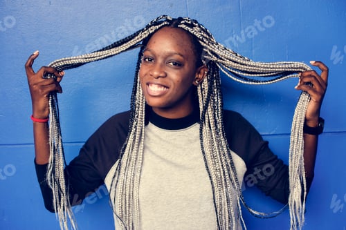 Preview: Portrait of a woman with dreadlocks