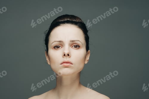Preview: pretty woman with bare shoulders emotions cropped view gathered hair