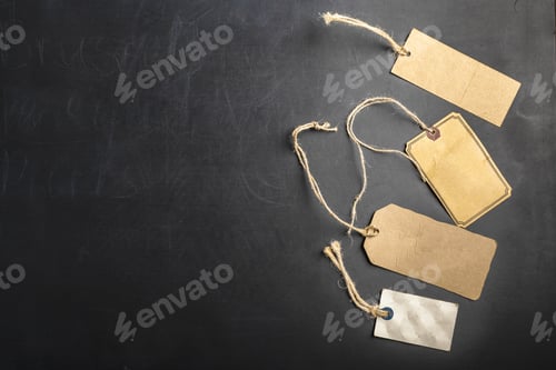 Price Tags on Dark Background with Chalkboard Texture