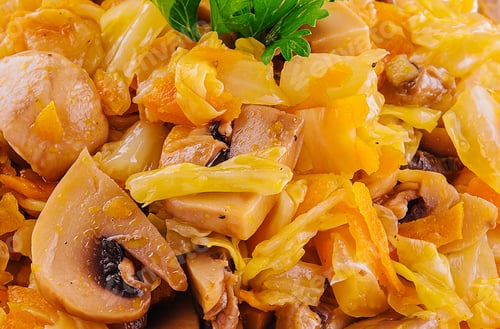 Preview: Fried cabbage with mushrooms close up