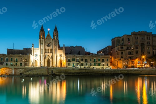 Preview: Illuminated Balluta parish church in Balluta bay, Malta