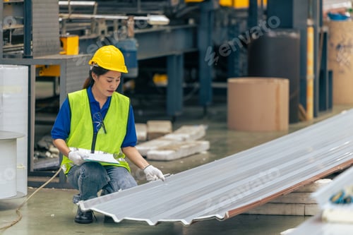 Preview: Asian woman engineer worker, professional employee working in metal sheet plant factory