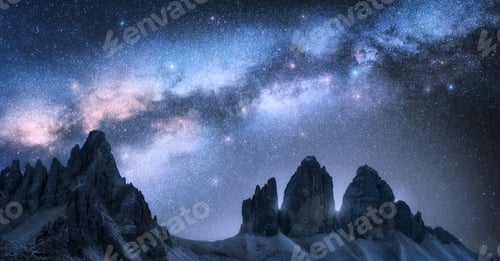 Preview: Milky Way arch over mountain peaks at night in summer