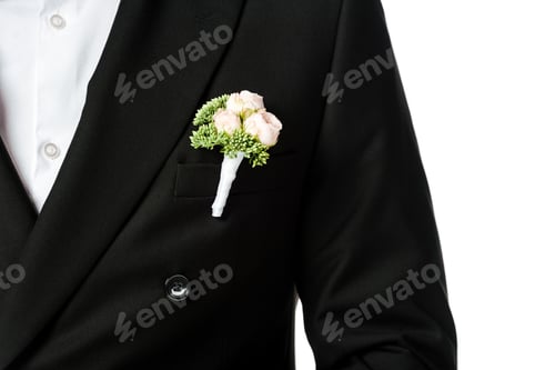 Preview: cropped shot of groom in stylish black suit with boutonniere isolated on white