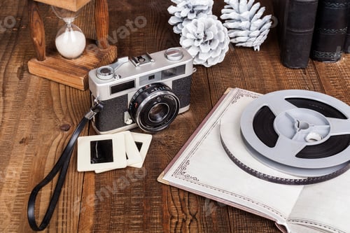 Preview: Vintage Camera and Film Still Life on Wood