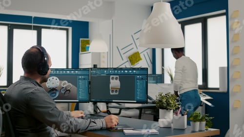 Preview: Mecanic technician working on cad software using computer