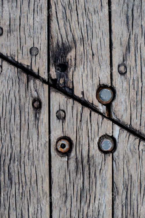 Preview: a close up shot of an old wooden planked board