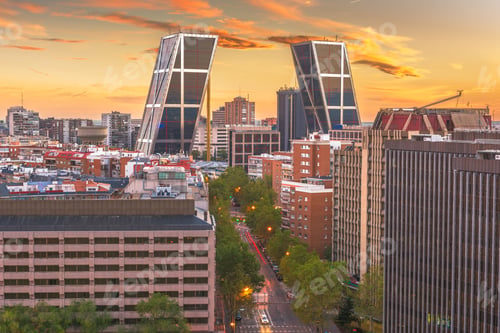 Preview: Madrid, Spain financial district skyline at dusk.