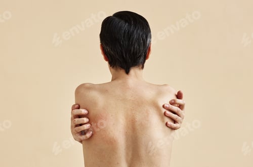 Preview: Minimal rear view of adult woman with bare back