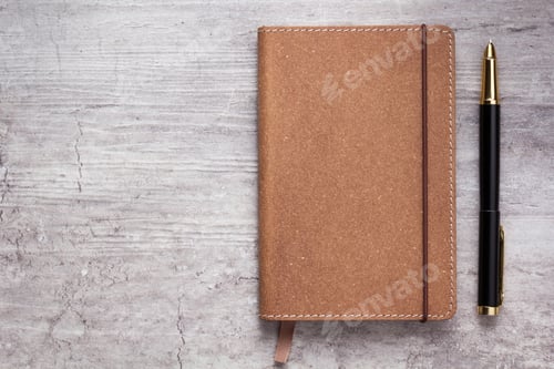 Preview: notepad or notebook paper at stone background