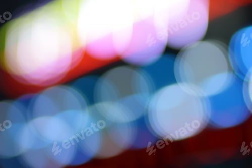 Preview: Blue, Red, Yellow, Blue, White Blurred Festive Bokeh Background With Stars For Christmas