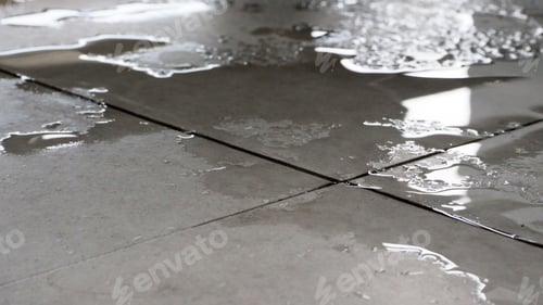 Preview: Wet floor close up. it can cause slippery by water.