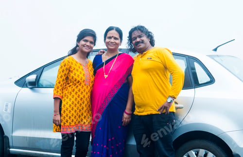 Preview: Indian family with car at outdoor