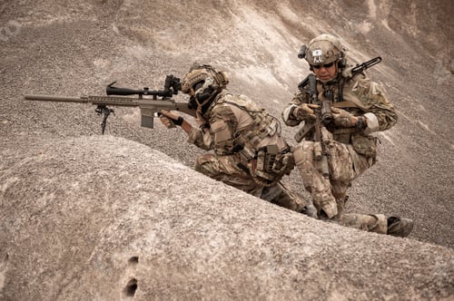 Preview: Soldiers aiming with their rifles
ready to fire during military operation