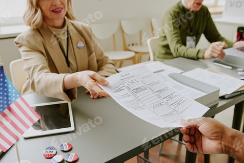 Preview: Unrecognizable Person Taking Ballot Paper