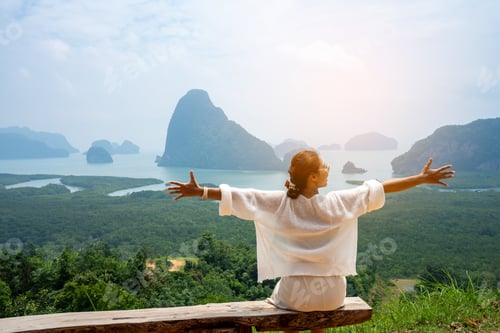 Preview: beautiful Refreshed woman Graden. Happy woman at Samet Nangshe Viewpoint park of Thailand.