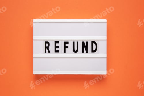 Preview: Lightbox with word refund on orange background. Business concept