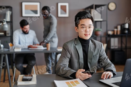 Preview: Asian Man In Office