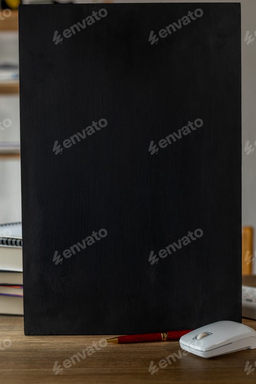 Preview: Chalkboard and school supplies on table. Student home workplace