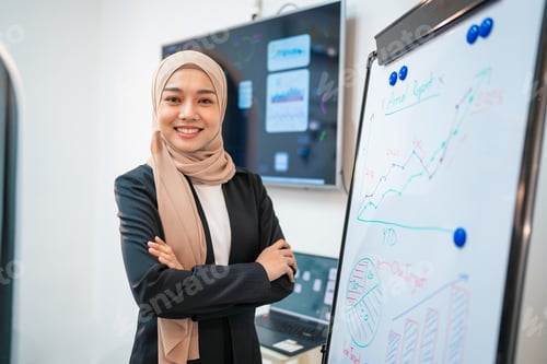 Preview: Successful asian businesswoman working and looking camera in a meeting room.