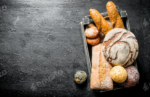 Preview: Various types of wheat and rye bread in the basket.