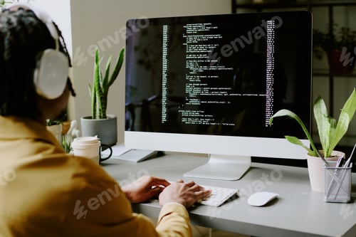 Preview: Unrecognizable Black Specialist Coding In Office