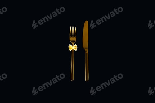 Preview: uncooked farfalle pasta on metal fork near knife isolated on black