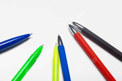 Preview: different colors pens isolated on the white background