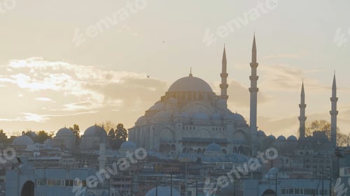 Preview: Beautiful view of majestic mosque on background of dawn. Action. Ancient mosque towers over area of