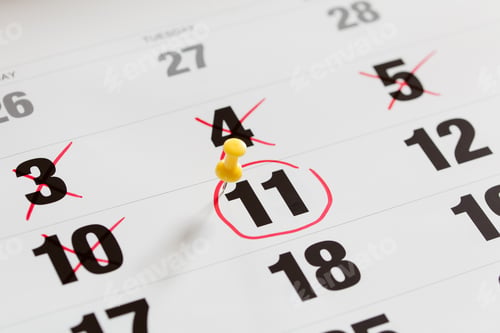 Preview: Red circle marked and pin pushed on a calendar and X Mark for counting down