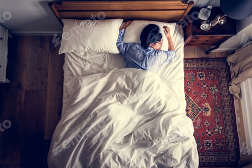Preview: Asian woman on the bed sleeping by herself