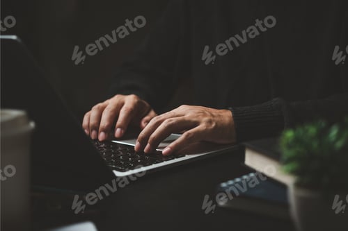 Preview: Hands typing on a keyboard.Businessman working on new project with notebook computer, job