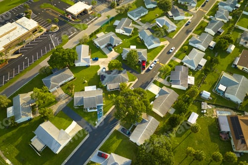 Preview: Aerial view of small town America suburban landscape with private homes
