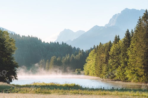 Preview: Amazing foggy Sunrise at Geroldsee, also Wagenbruchsee, Bavaria, Germany Europe