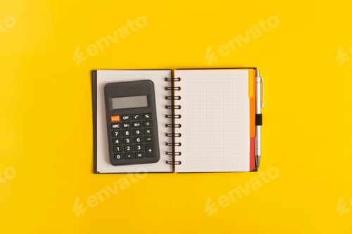 Preview: Notebook and calculator on table. Financial development, Banking Account, Statistics