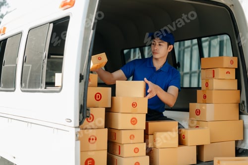 Preview: Portrait of courier delivery Asian man searching the address on digital tablet.