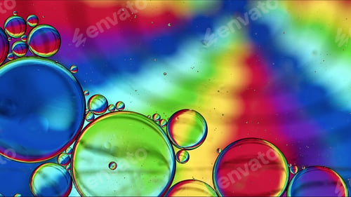 Preview: Abstract Colorful Food Oil Drops Bubbles and spheres Flowing on Water Surface