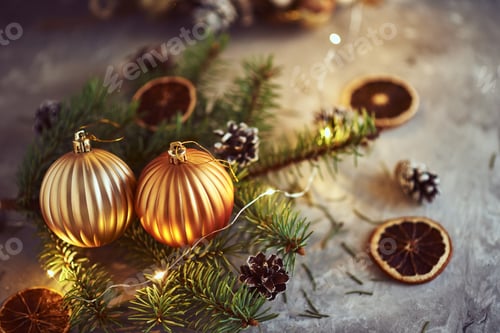 Preview: Christmas decorations with garland lights and fir tree branch