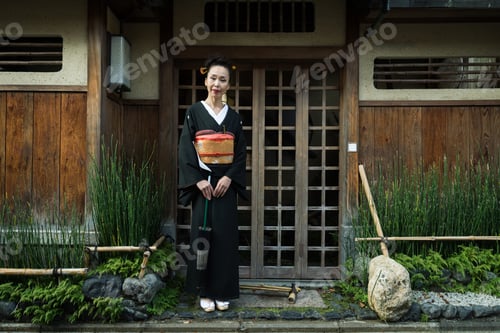 Preview: Asian woman with yukata walking in Kyoto, Japan