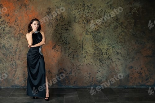 Preview: Beautiful woman in black evening dress