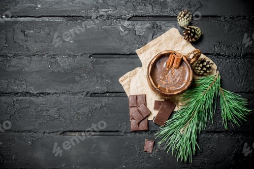 Preview: Hot chocolate with cinnamon sticks.
