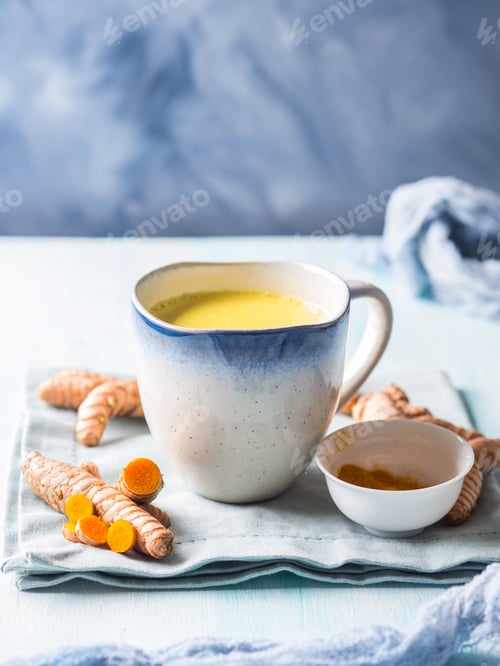 Preview: Golden turmeric milk drink in mug