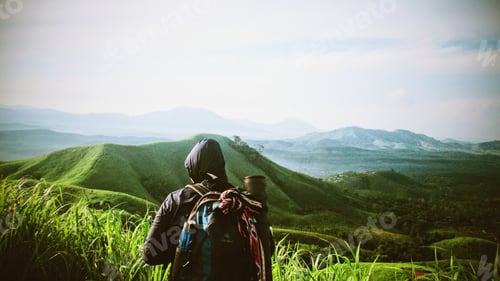 Preview: Backpacker Enjoys Serene Green Mountain View
