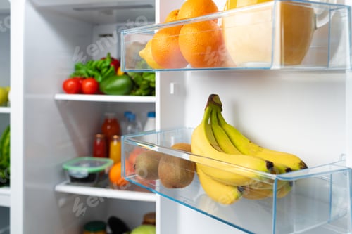 Preview: Open fridge full of fruits, vegetables and drinks