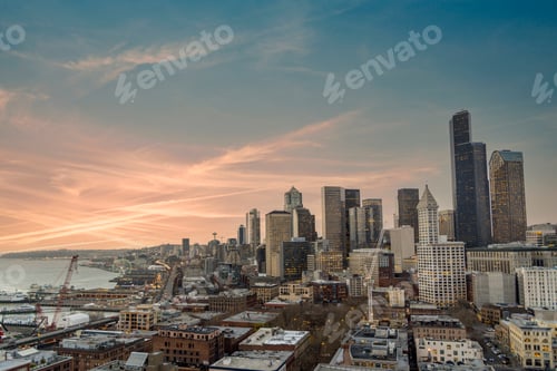 Preview: Downtown Seattle Washington skyline with waterfront at sunset.