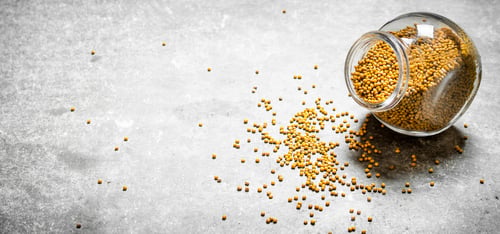 Preview: Mustard seeds in glass jar.