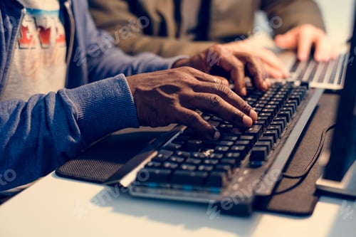 Preview: Hacker using keyboard typing phishing on the internet
